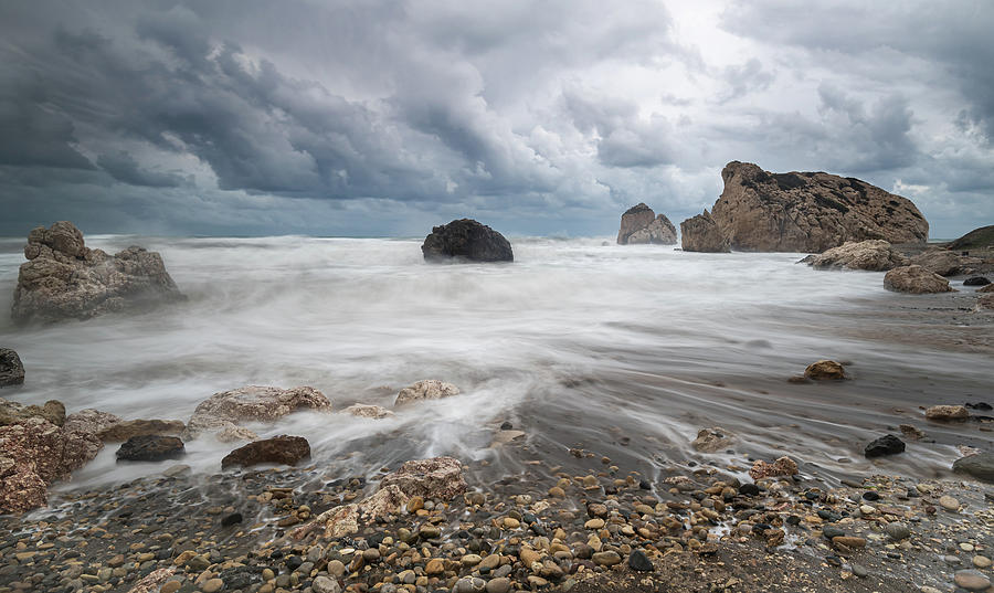 Seascape with windy waves during storm weather at the a rocky co Photograph by Michalakis Ppalis