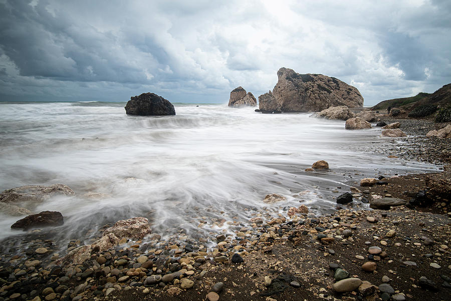 Seascape with windy waves during stormy weather on a rocky coast Photograph by Michalakis Ppalis