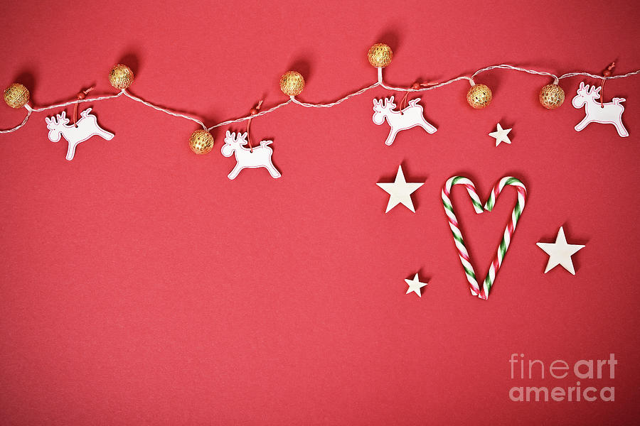 Seasonal greeting card concept with Christmas lights and candy cane heart Photograph by Mendelex Photography