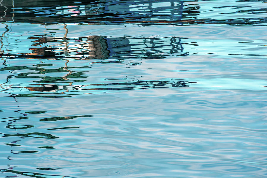 Seawater Reflections In Blue Photograph