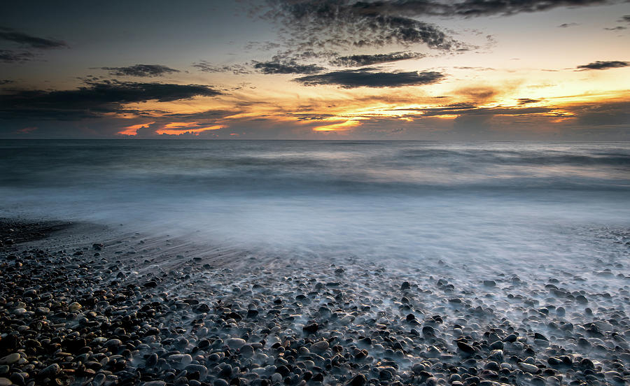 Seawaves splashing on the coast during a dramatic sunset Photograph by Michalakis Ppalis