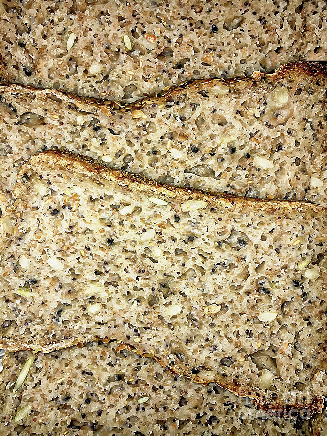 Bread Photograph - Seeded bread slices by Tom Gowanlock