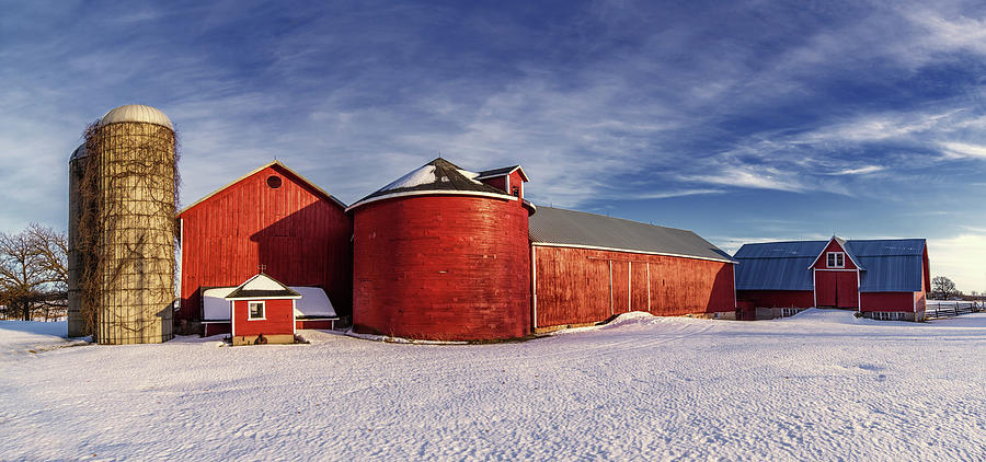 Seeing Red -   Red buildings and round wood silo at Lake Mills WI Photograph by Peter Herman