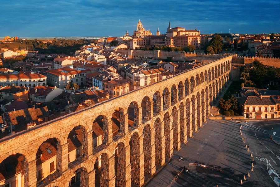 Segovia Aqueduct and city architecture Photograph by Songquan Deng