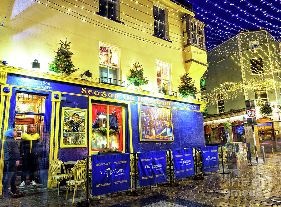 Sehan Ua Neachtain at Night in Galway Photograph by John Rizzuto