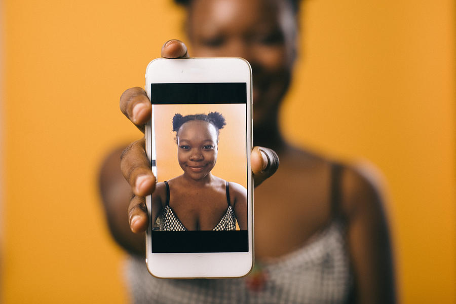 Selfie of Black Woman on Smartphone Photograph by Willie B. Thomas