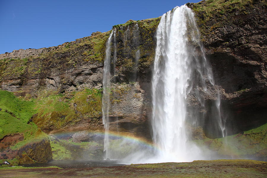 Seljalandsfoss waterfall with rainbow, Iceland Photograph by Pejft