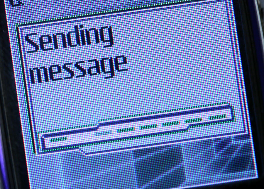 Sending Text Message Photograph by spxChrome