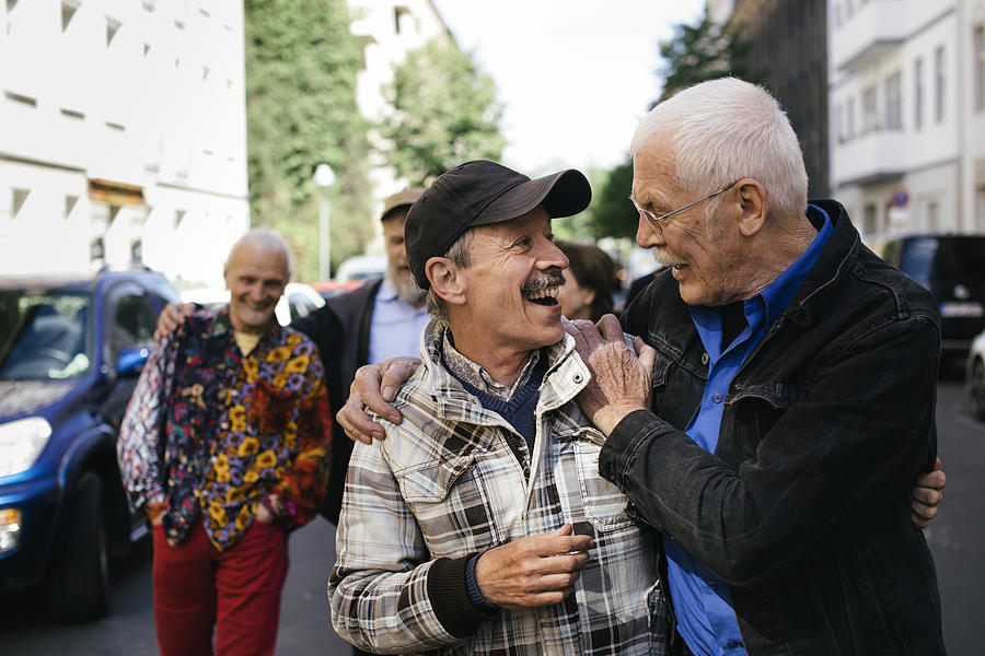 Senior Gay Men Embracing Photograph by Willie B. Thomas