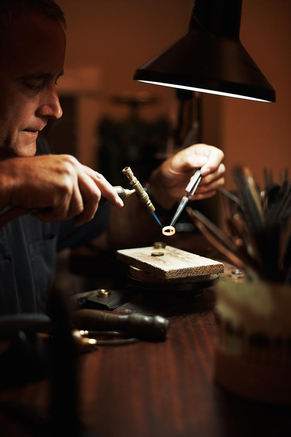 Senior man making a ring Photograph by Jacob Wackerhausen