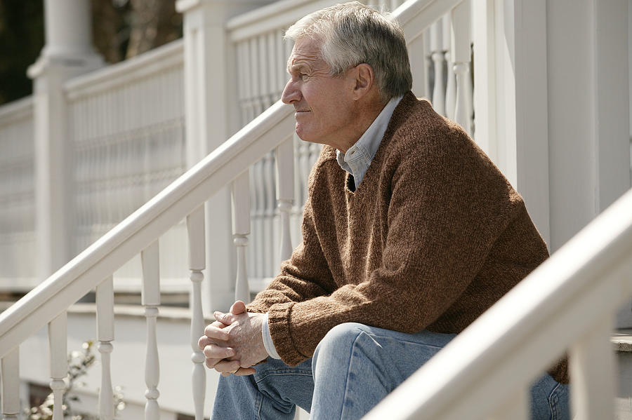 Senior man on porch Photograph by Comstock