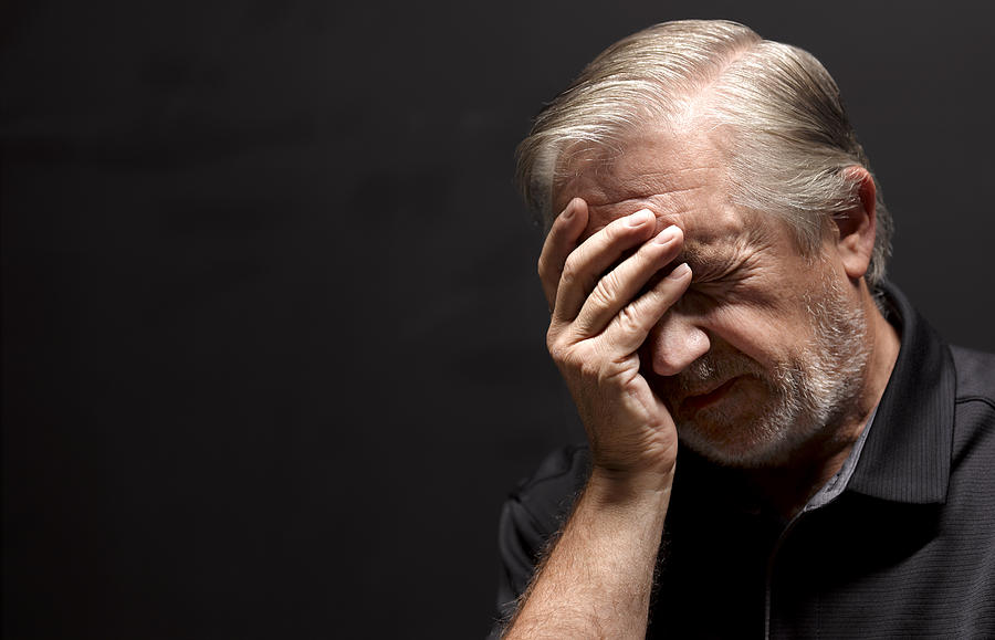 Senior Man With Headache Amnesia Photograph by Peter Dazeley