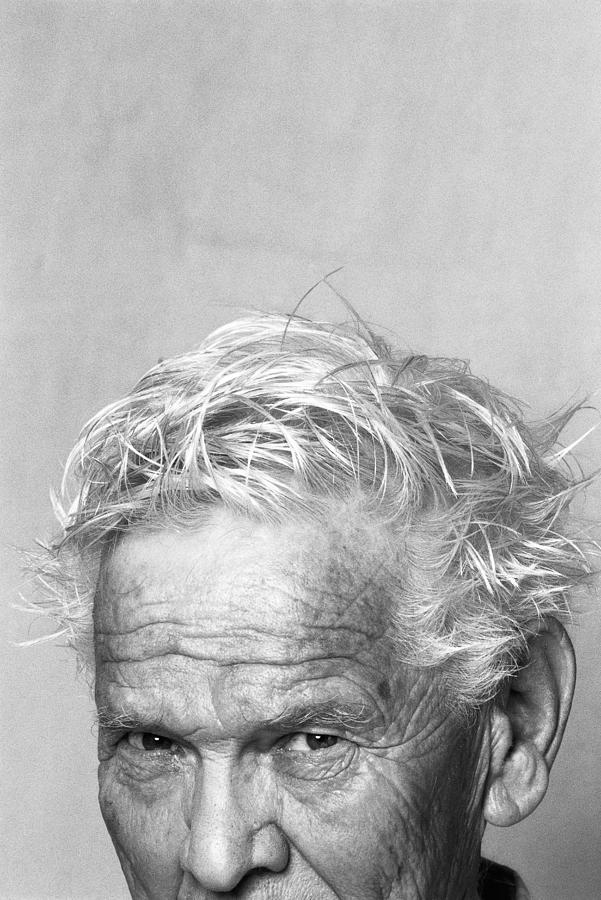 Senior man with messy hair, portrait, cropped Photograph by PhotoAlto/Isabelle Rozenbaum