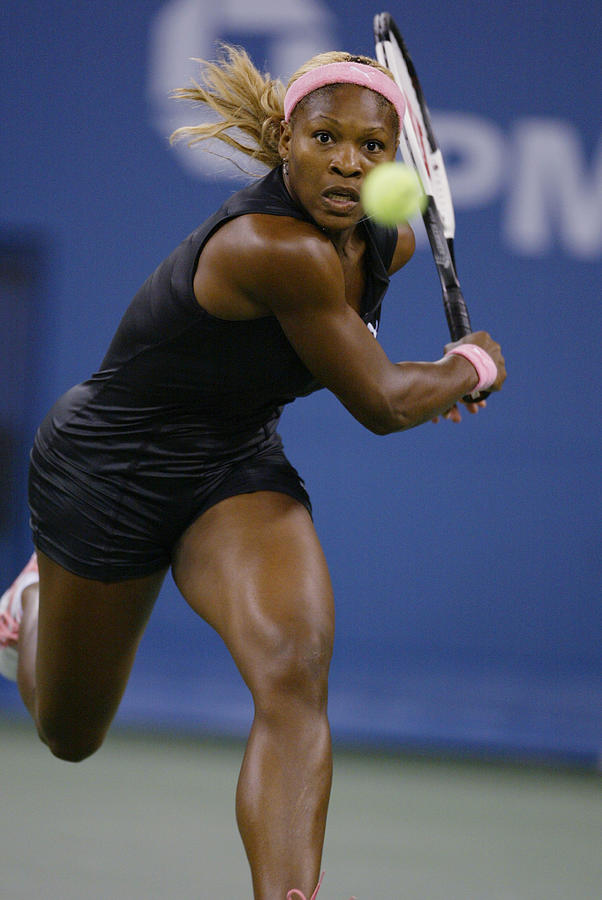 Serena Williams returns  Photograph by Al Bello