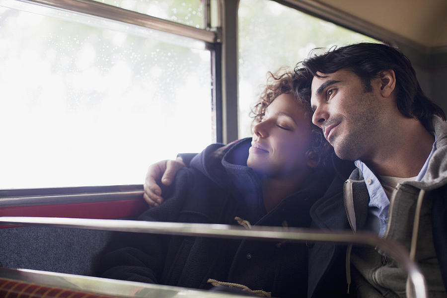 Serene couple hugging on bus Photograph by Sam Edwards