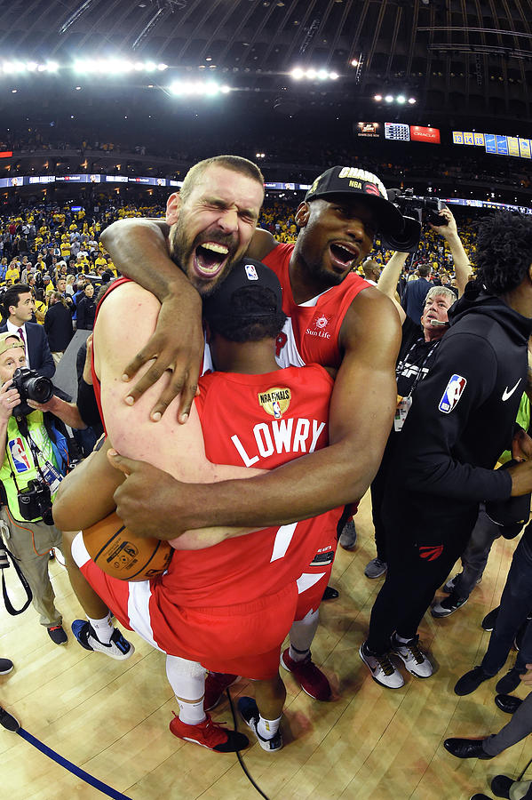 Serge Ibaka, Marc Gasol, and Kyle Lowry Photograph by Andrew D. Bernstein