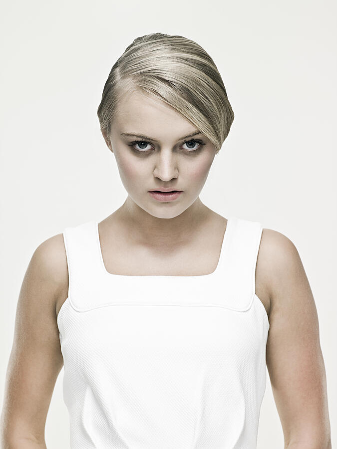 Serious young blond woman Photograph by Image Source