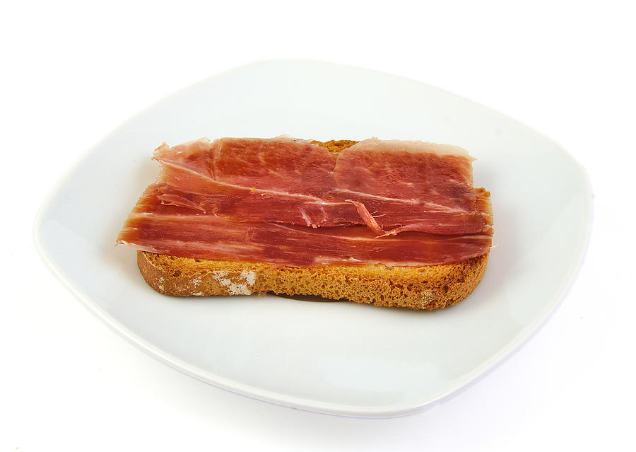 Serrano ham on toasted bread. Jabugo. Spanish tapa Photograph by Jorgecachoh