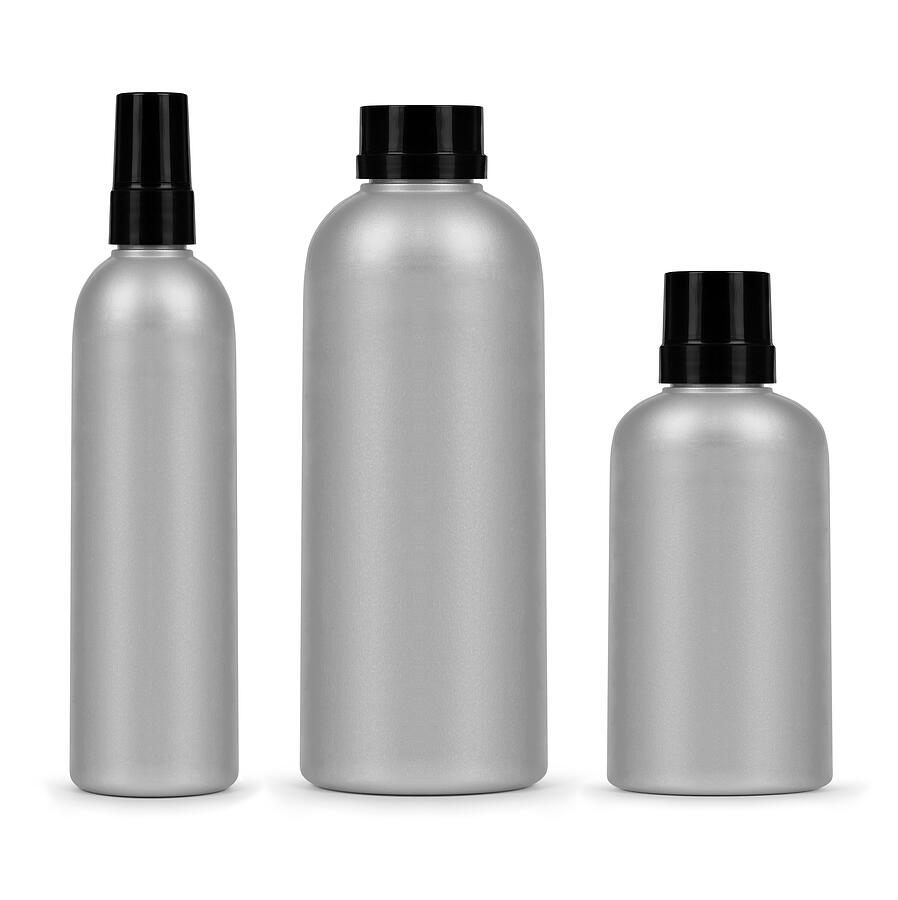 Set Of Three Cosmetic Bottles Isolated On A White Background Photograph by Krafla