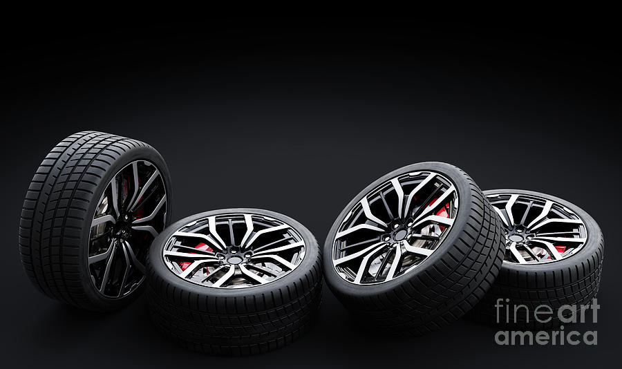 Set of wheels with modern alu rims on black background Photograph by Michal Bednarek