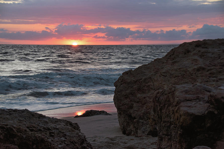 Setting Sun Dipping Below the Horizon Photograph by Matthew DeGrushe