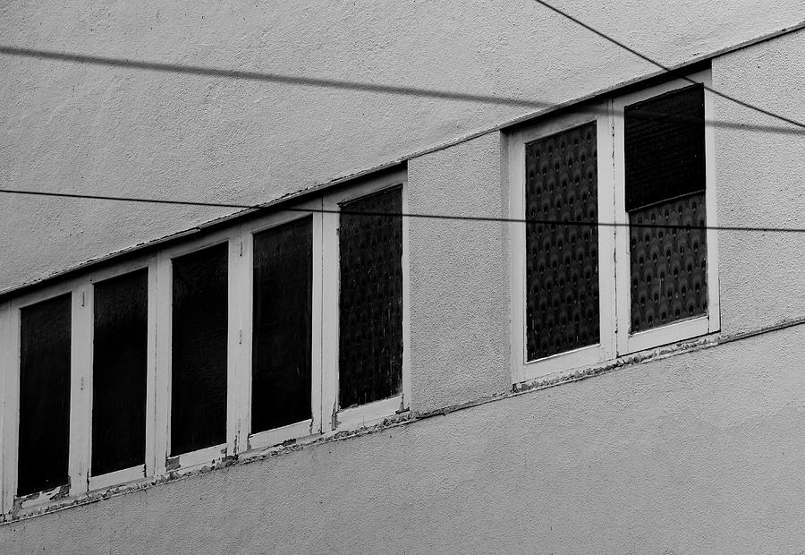Seven Windows Vs Three Wires Photograph by Prakash Ghai