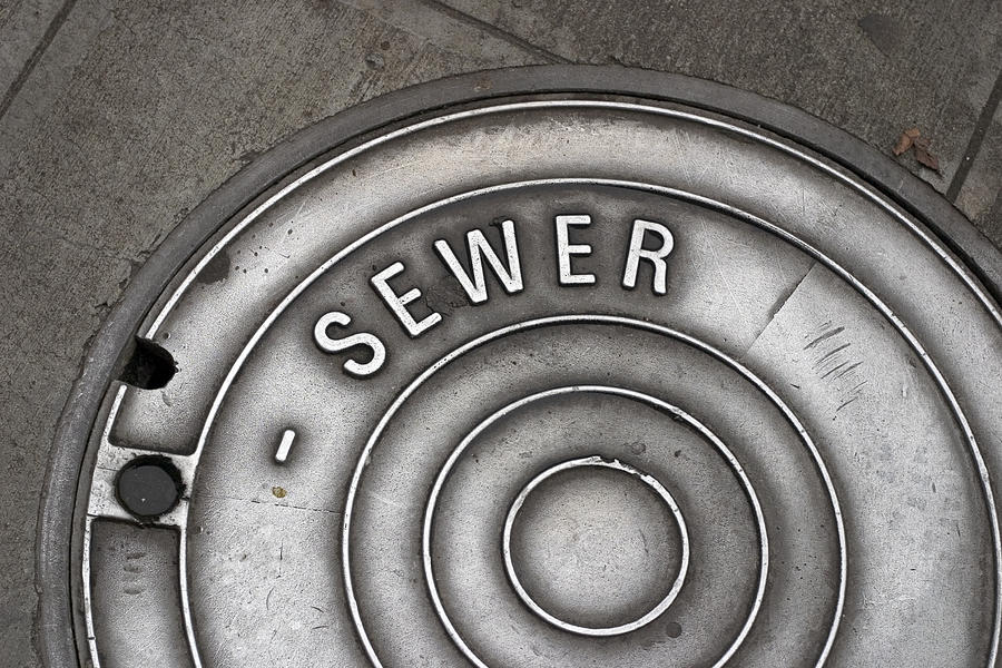 Sewer Manhole Cover Photograph by Grapegeek