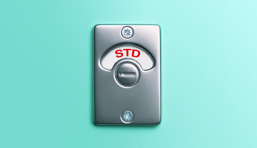Sexually Transmitted Disease Toilet Door Lock Photograph by Peter Dazeley