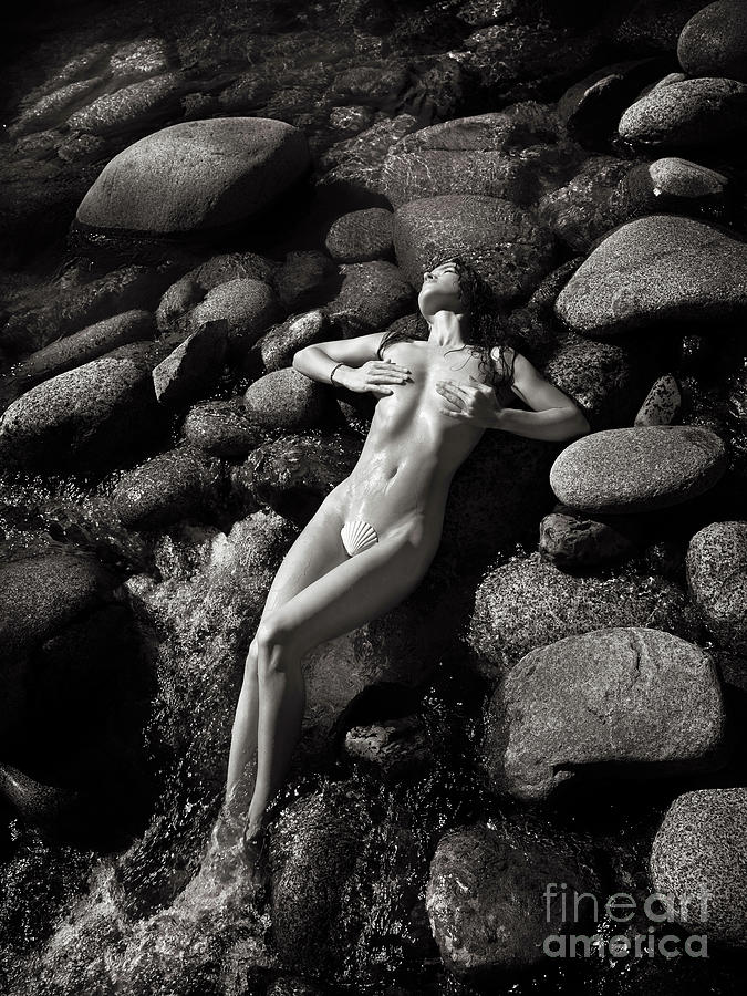 Sexy nude woman lying on rocks in water with her sensual wet naked body bare Wall Art Print MXI33536 Photograph by Maxim Images Exquisite Prints