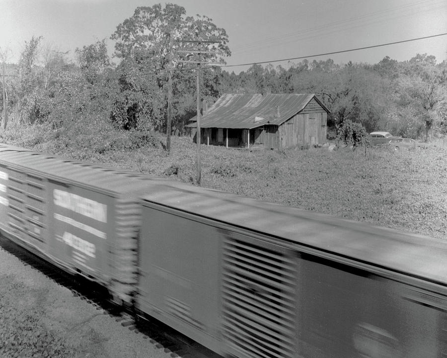 Shack and train Photograph by John Simmons