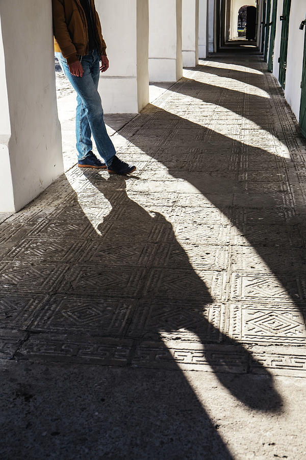 Shadow Of Feet Photograph by Iuliia Malivanchuk