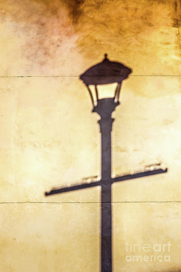 Shadow of street lamp on wall Photograph by Bryan Mullennix