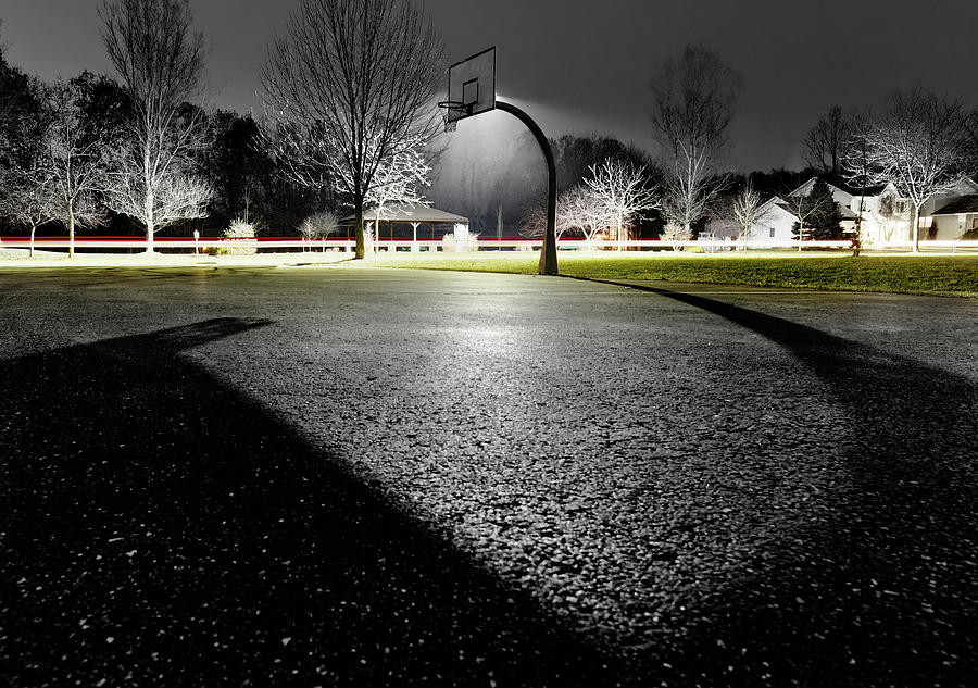 ShadowBall -  basketball hoop in Stoughton WI casts interesting shadow on asphalt Photograph by Peter Herman
