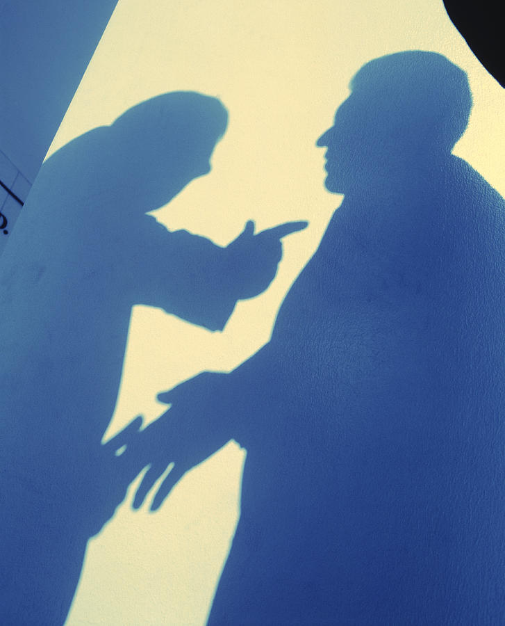 Shadows of two men arguing, (Low angle view) Photograph by Photodisc Shadows of two men arguing, (Low angle view) Photograph by Photodisc