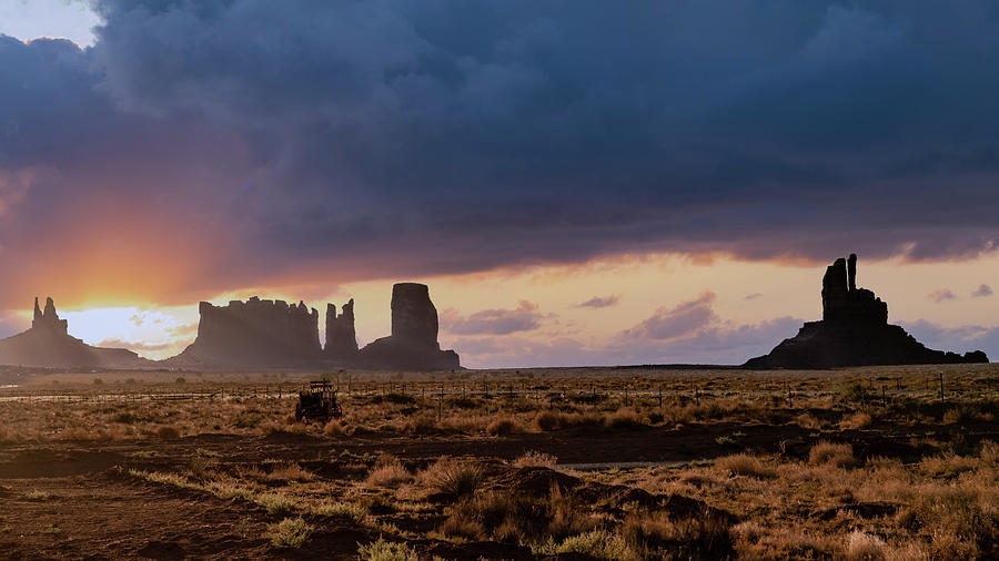 Shadowy Silhouettes - Monument Valley Photograph by G Lamar Yancy