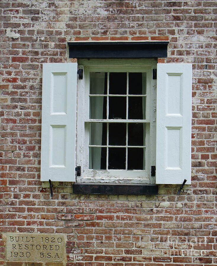 Shaker Style Flat Panel Shutter Against White Washed Brick Photograph