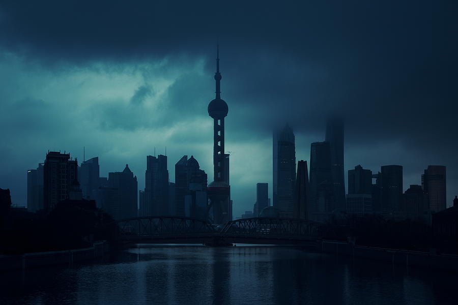 Shanghai city skyline view with overcast sky Photograph by Songquan Deng