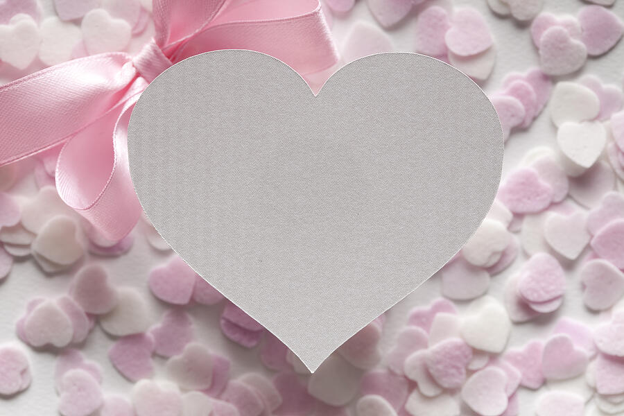 Shape of heart, pink bow and many hearts in background Photograph by Tedestudio