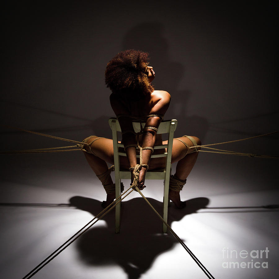 Bondage tied to chair