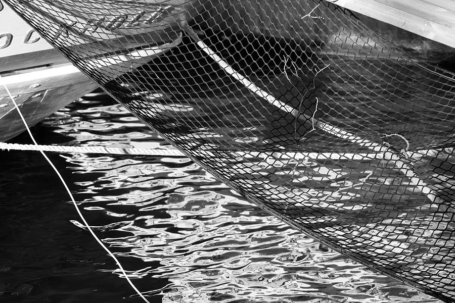 Ship railing net, ropes and sea water form pattern in a harbor bay - monochrome Photograph by Ulrich Kunst And Bettina Scheidulin