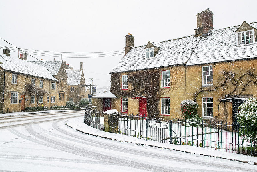 Shipton Under Wychwood Cottages in the Snow  Photograph by Tim Gainey
