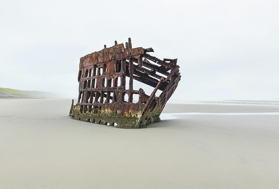Shipwreck hugged by fog Photograph by Rudy Wilms