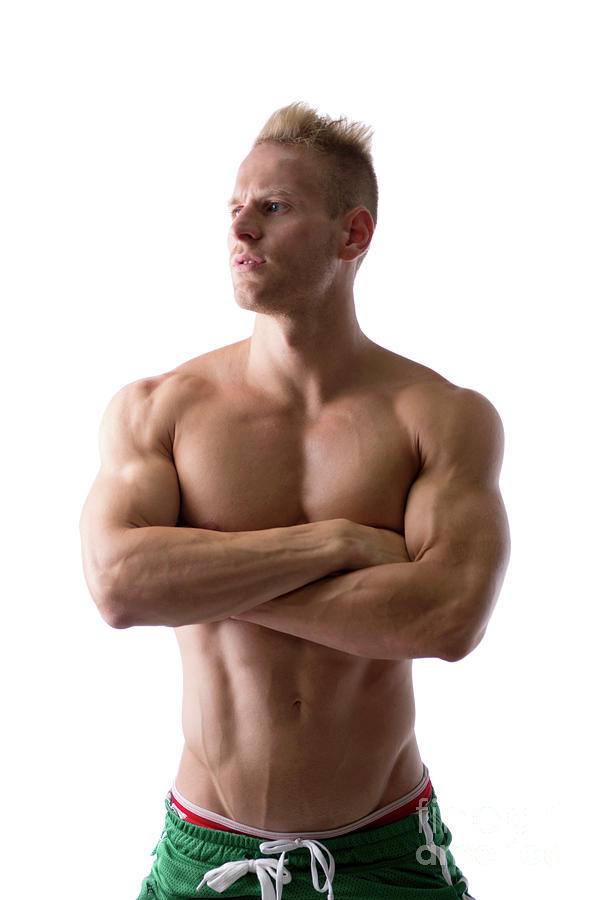 Portrait of shirtless muscular man standing with arms crossed Stock Photo -  Alamy