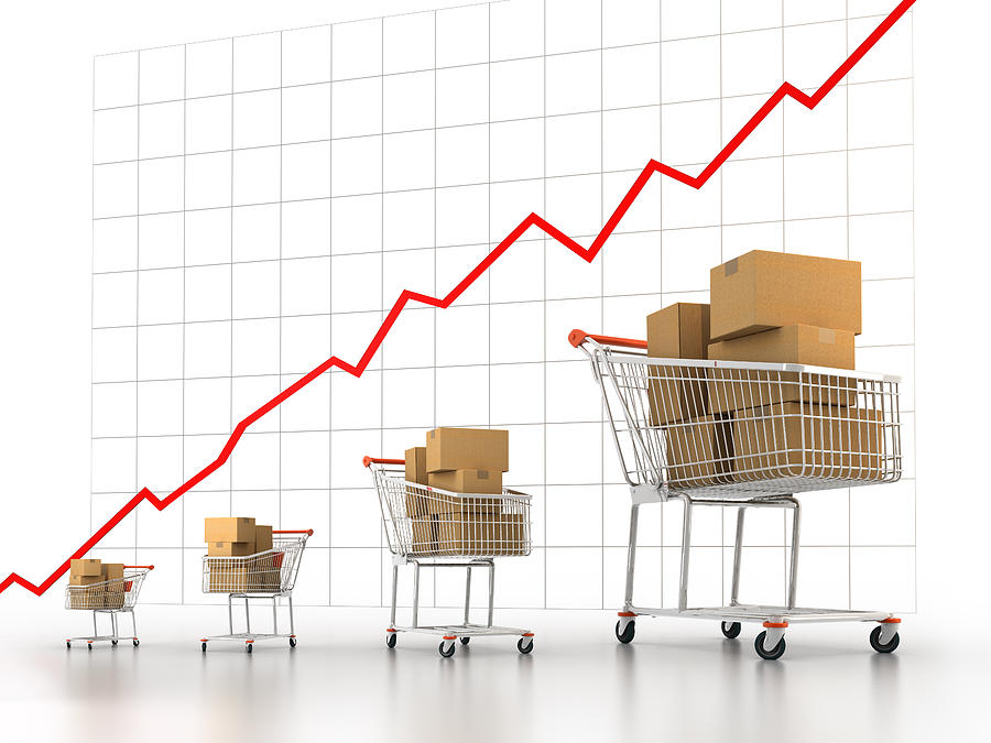 Shopping carts increasing in size (Clipping path included) Photograph by Henrik5000