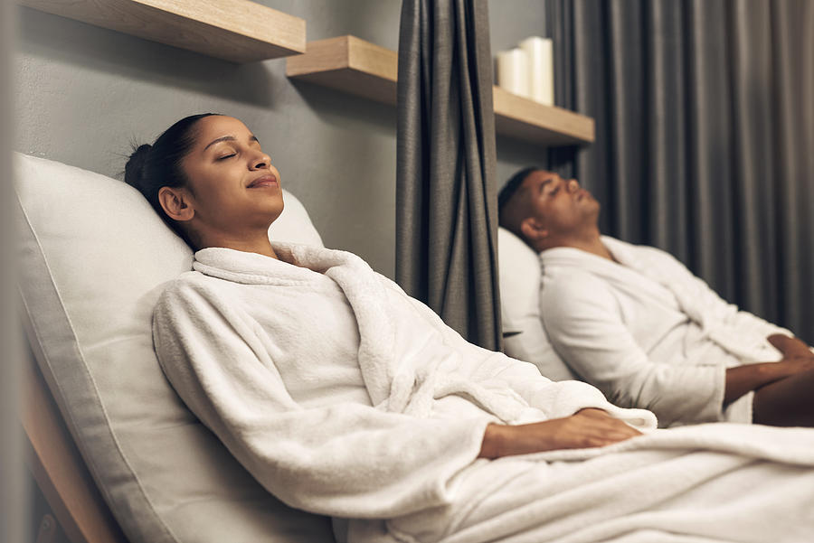 Shot of a young couple spending the day together at a spa Photograph by PeopleImages