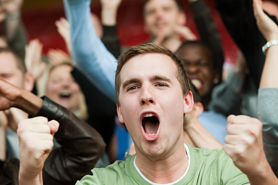 Shouting man at football match Photograph by Image Source
