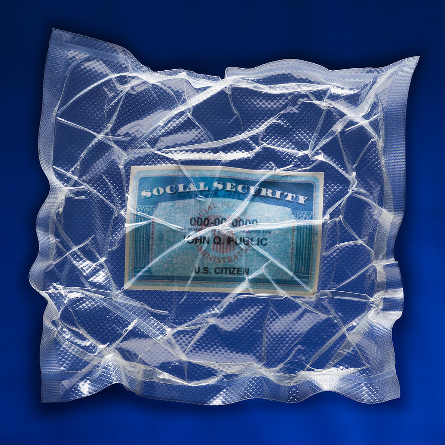 Shrink wrapped social security card Photograph by Mike Kemp