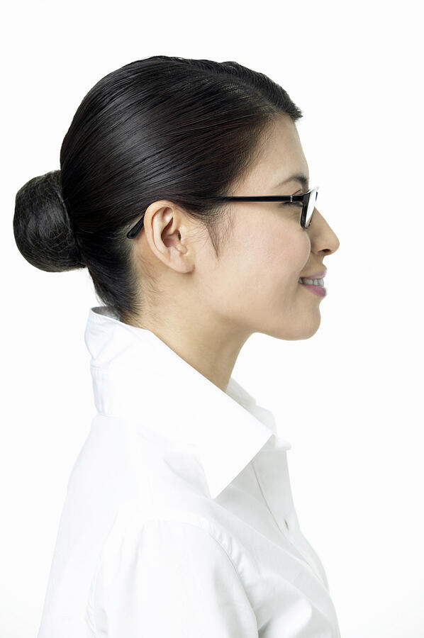 Side View of a Businesswoman Wearing Spectacles Photograph by Mash
