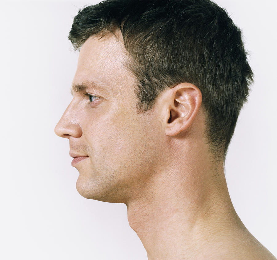 Side View of a Mans Head Photograph by Digital Vision.