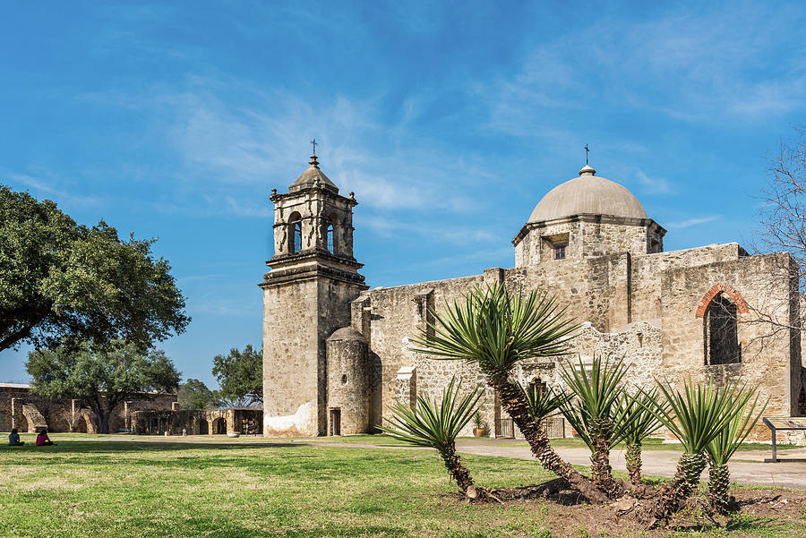 Side view of Mission San Jose with cacti plants in foreground ...